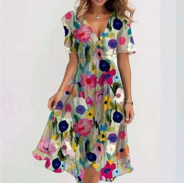 Robe d'été fleurie, mousseline fluide. Coupe élégante et féminine.  Parfait pour l'été.