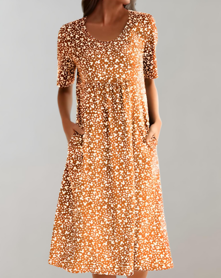 "Robe d'été fluide col V, légère et élégante, manches courtes, parfaite pour jours ensoleillés"