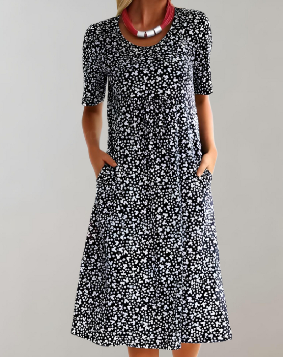 "Robe d'été fluide col V, légère et élégante, manches courtes, parfaite pour jours ensoleillés"