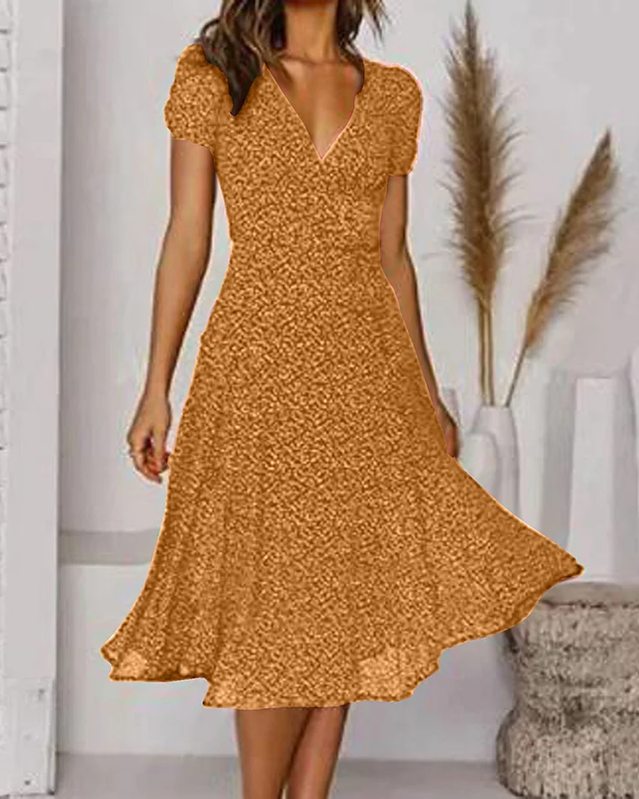 Robe d'été fluide, imprimé coloré, col V, manches courtes.  Look élégant et décontracté.