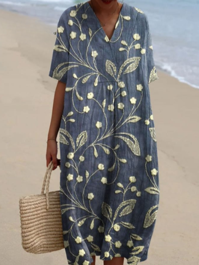 Robe d'été fluide, imprimé floral, coupe élégante et confortable.  Parfait pour l'été.