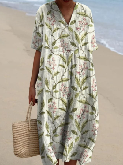 Robe d'été fluide, imprimé floral, coupe élégante et confortable.  Parfait pour l'été.