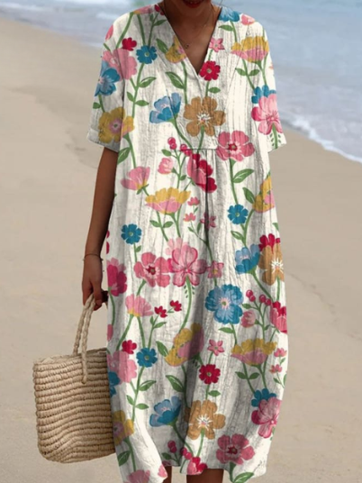 Robe d'été fluide, imprimé floral, coupe élégante et confortable.  Parfait pour l'été.