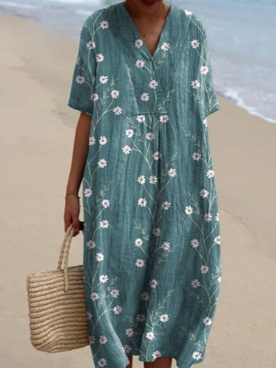 Robe d'été fluide, imprimé floral, coupe élégante et confortable.  Parfait pour l'été.
