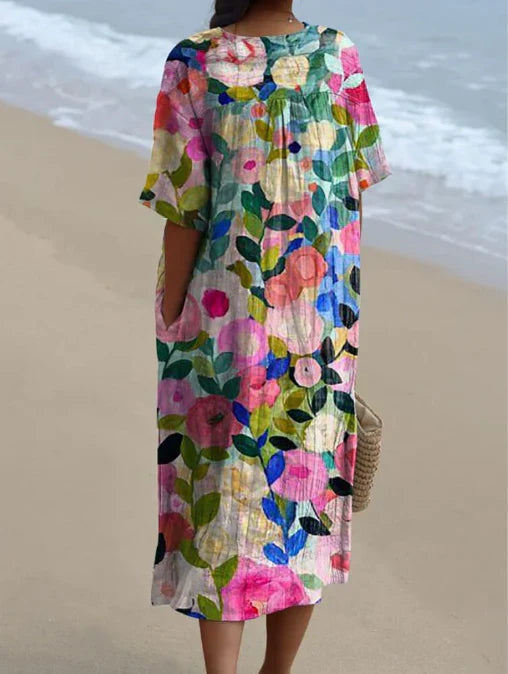 Robe d'été fluide, imprimé floral, coupe élégante et confortable.  Parfait pour l'été.