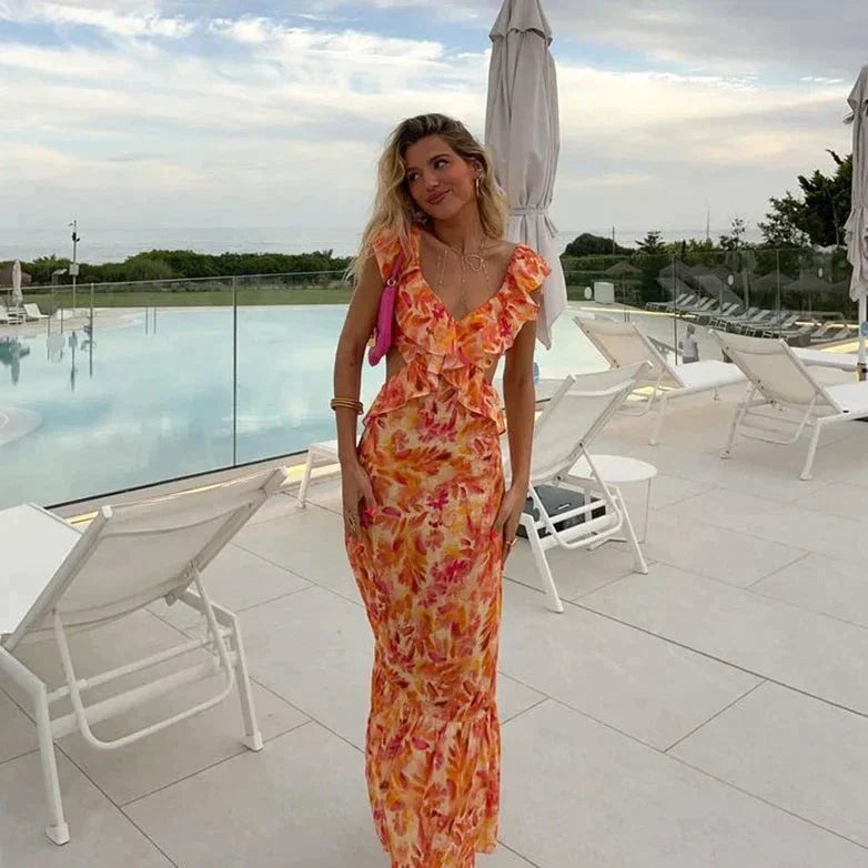 Robe d'été imprimée, volants, coupe chic et féminine.  Parfait pour l'été.
