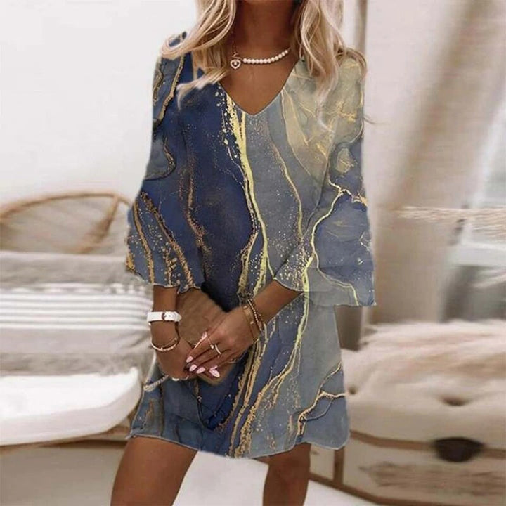 "Robe élégante Anaïs pour femme, imprimé moderne style chic en polyester avec coupe flatteuse, ajustée aux courbes féminines.