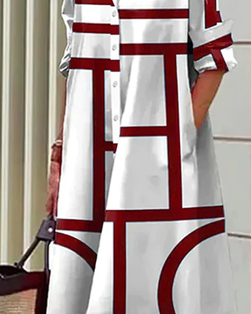 Robe élégante, imprimé géométrique, poches.  Coupe flatteuse et confortable.  Idéale pour toutes occasions.
