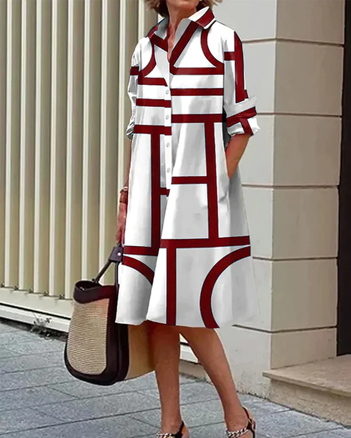 Robe élégante, imprimé géométrique, poches.  Coupe flatteuse et confortable.  Idéale pour toutes occasions.