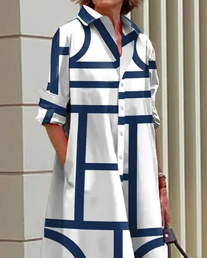 Robe élégante, imprimé géométrique, poches.  Coupe flatteuse et confortable.  Idéale pour toutes occasions.