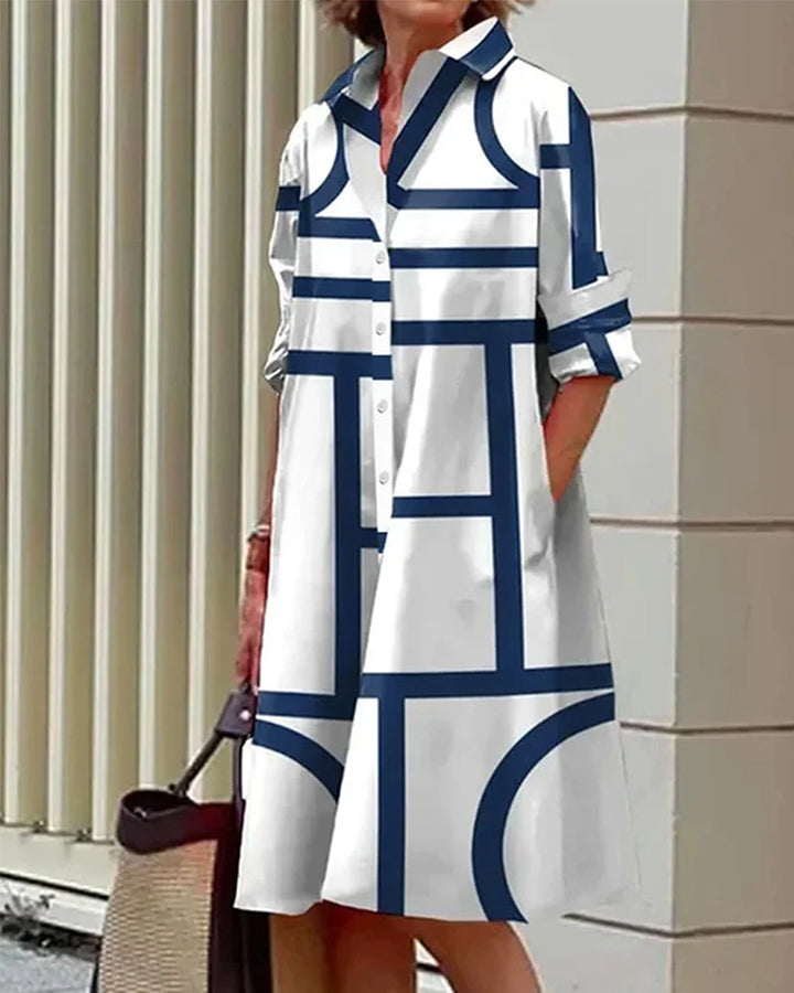 Robe élégante, imprimé géométrique, poches.  Coupe flatteuse et confortable.  Idéale pour toutes occasions.