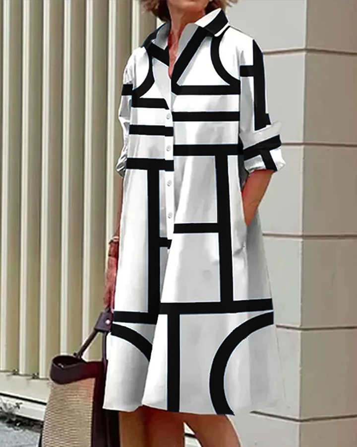 Robe élégante, imprimé géométrique, poches.  Coupe flatteuse et confortable.  Idéale pour toutes occasions.