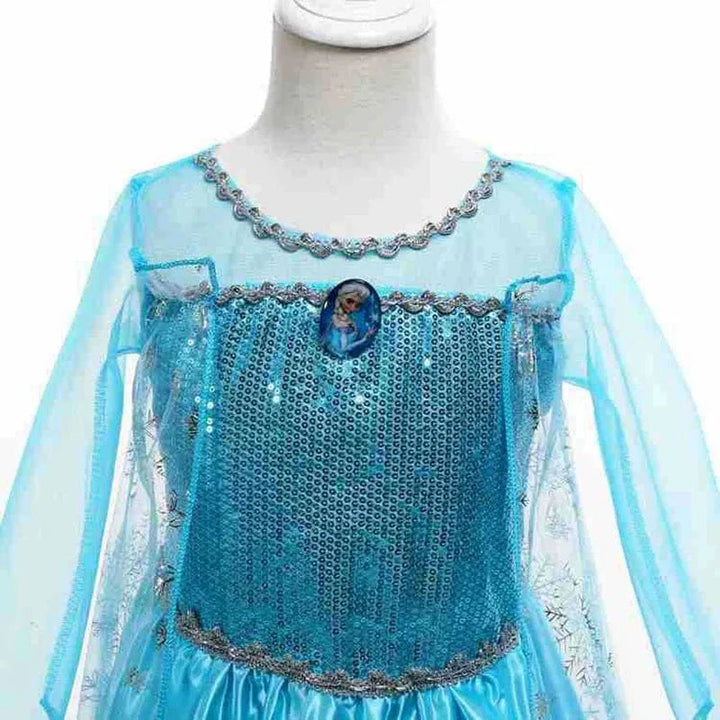 Robe Elsa enfant, déguisement Reine des Neiges bleu scintillant.  Parfait pour les fêtes!