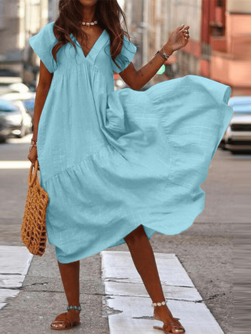 "Robe en coton Amalie ample, col V, pour femmes, séduisante et confortable, idéale pour look décontracté et chic."