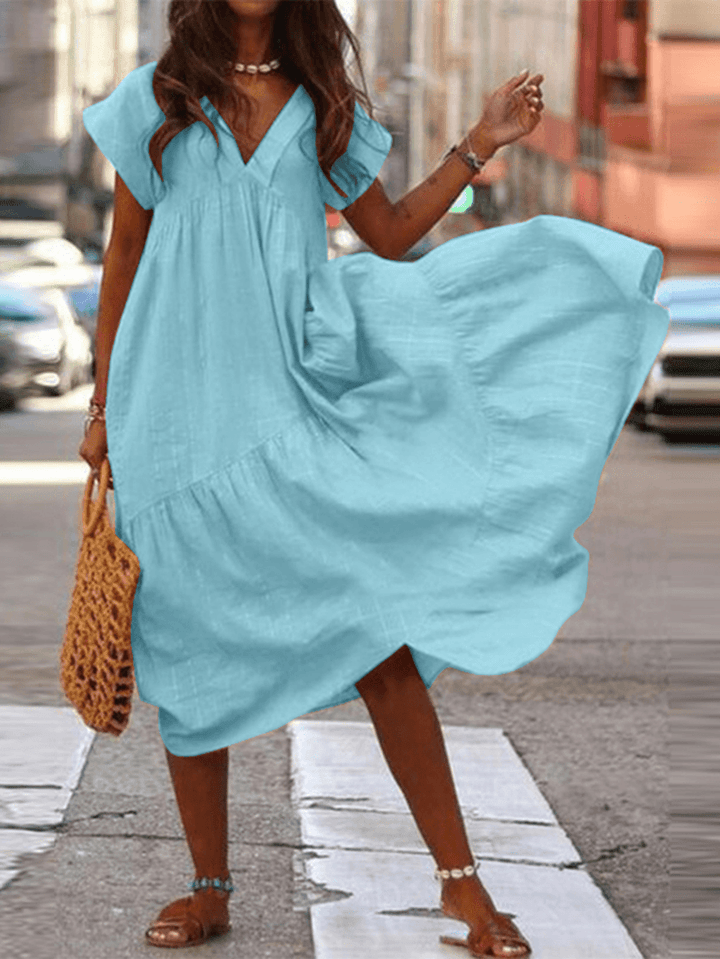 "Robe en coton Amalie ample, col V, pour femmes, séduisante et confortable, idéale pour look décontracté et chic."