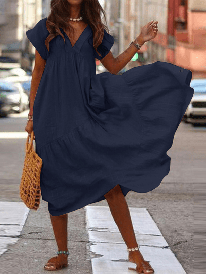 "Robe en coton Amalie ample, col V, pour femmes, séduisante et confortable, idéale pour look décontracté et chic."