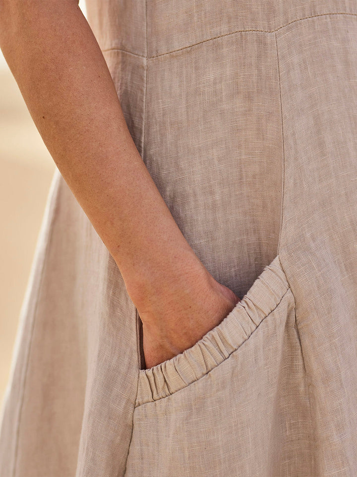 "Robe en coton douce avec poches, élégance et confort quotidien, coupe ample polyvalente pour le style décontracté."