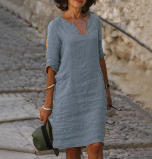 "Robe en lin col V décontractée pour femmes, coupe ample et fluide, parfaite pour l'été, disponible en diverses couleurs."
