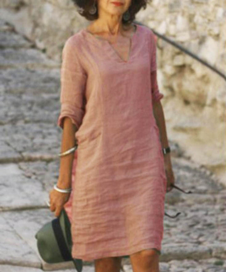 "Robe en lin col V décontractée pour femmes, coupe ample et fluide, parfaite pour l'été, disponible en diverses couleurs."