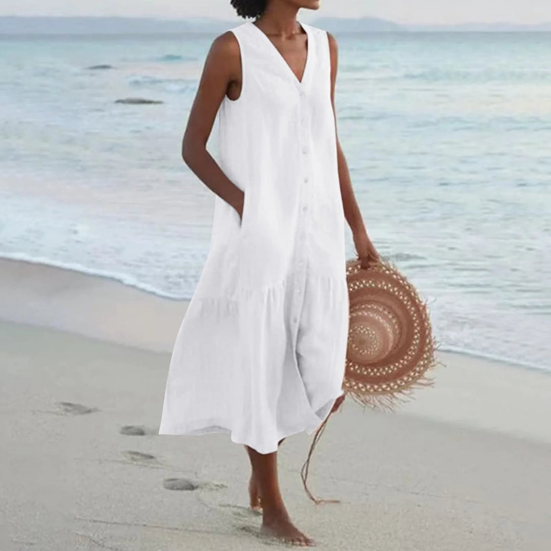 "Robe en lin décolleté V élégant, coupe fluide, vue de face, parfait pour l'été, disponible en couleurs variées."
