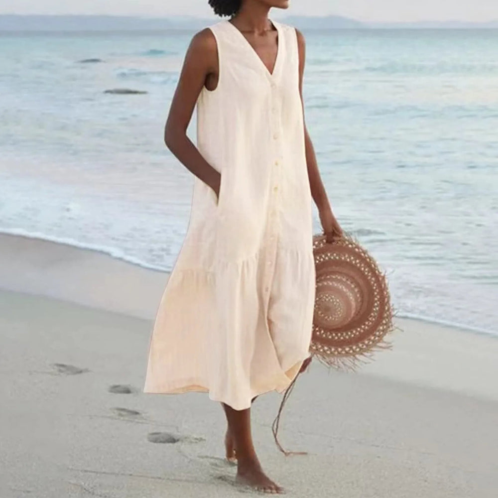 "Robe en lin décolleté V élégant, coupe fluide, vue de face, parfait pour l'été, disponible en couleurs variées."