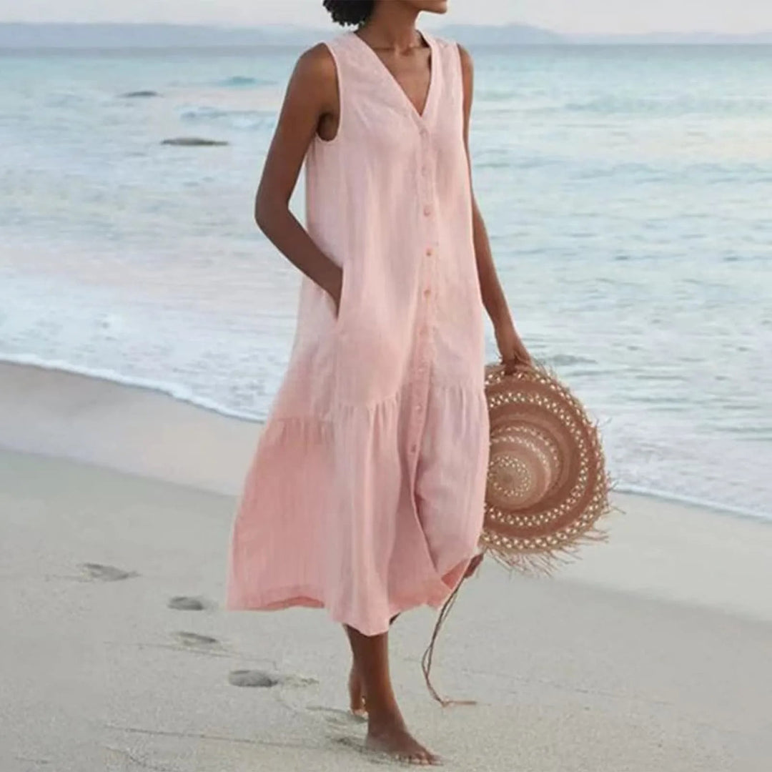 "Robe en lin décolleté V élégant, coupe fluide, vue de face, parfait pour l'été, disponible en couleurs variées."