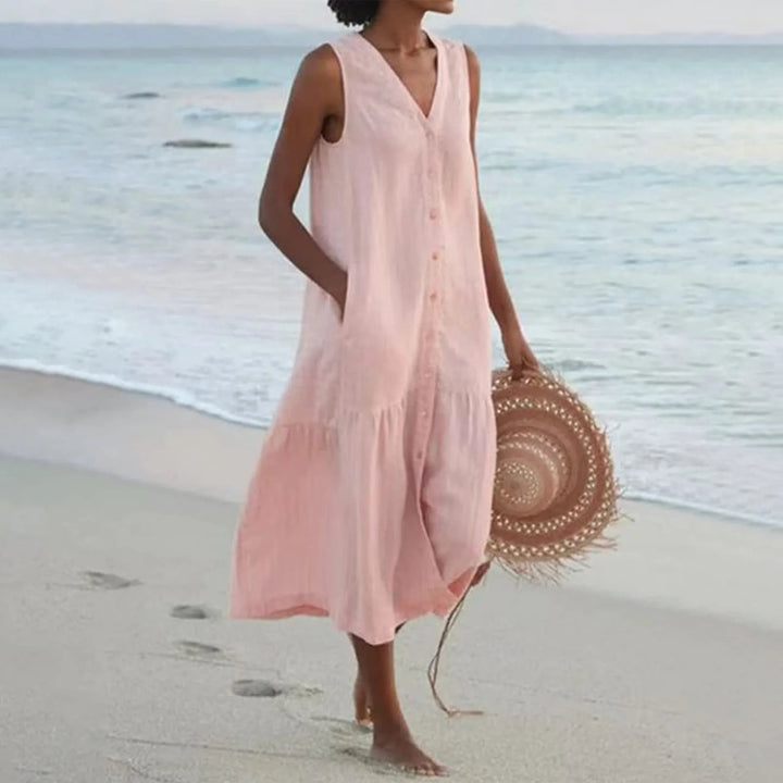 "Robe en lin décolleté V élégant, coupe fluide, vue de face, parfait pour l'été, disponible en couleurs variées."