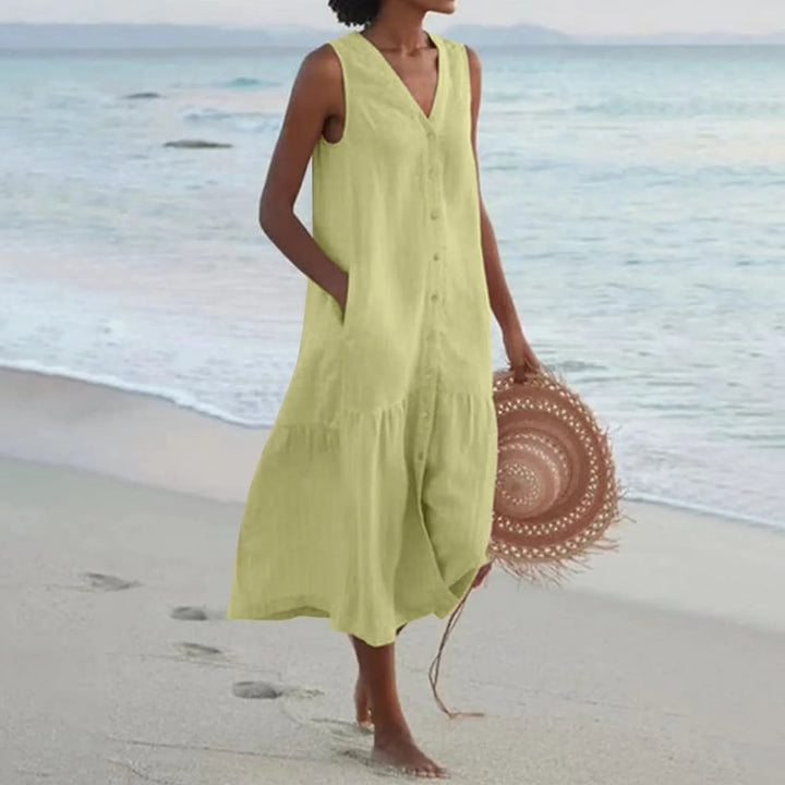 "Robe en lin décolleté V élégant, coupe fluide, vue de face, parfait pour l'été, disponible en couleurs variées."