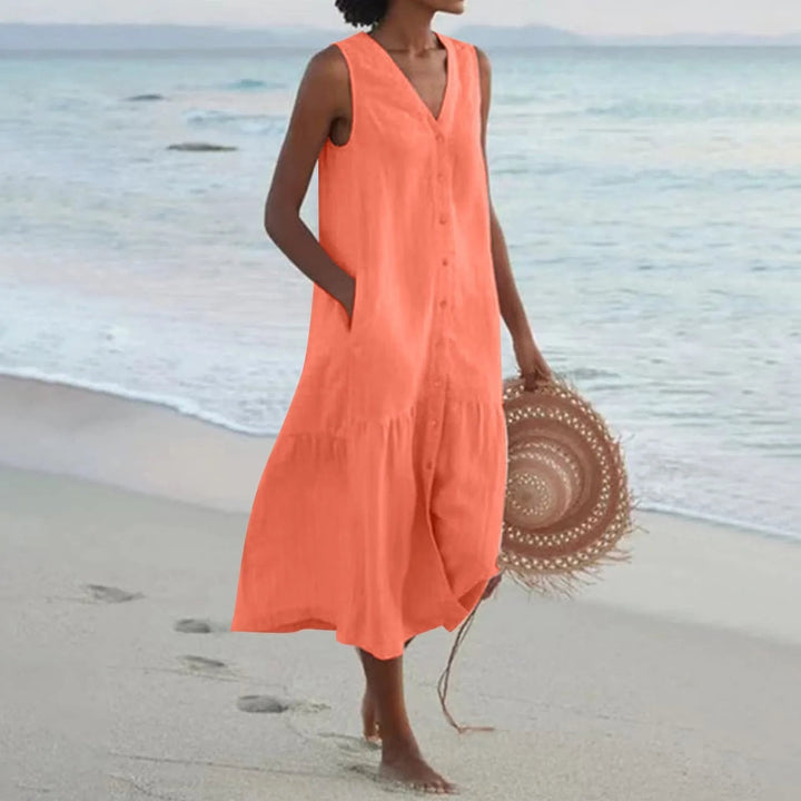 "Robe en lin décolleté V élégant, coupe fluide, vue de face, parfait pour l'été, disponible en couleurs variées."