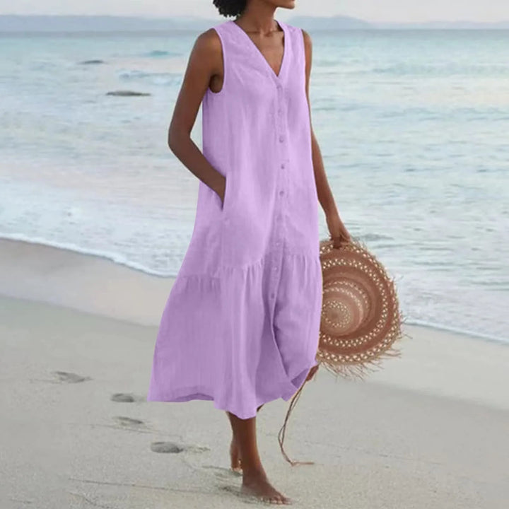 "Robe en lin décolleté V élégant, coupe fluide, vue de face, parfait pour l'été, disponible en couleurs variées."