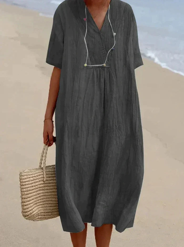 Robe estivale lin coton, coupe ample et fluide. Confort et style décontracté pour l'été.