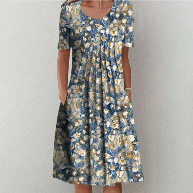 Robe été fleurie, coupe fluide et élégante.  Motif floral estival.  Parfait pour les occasions spéciales et le quotidien.