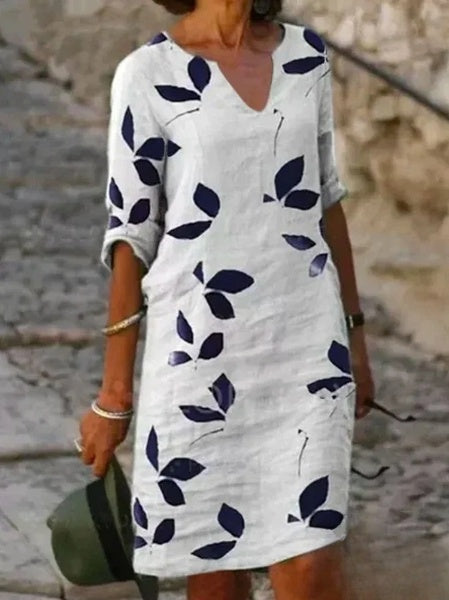 Robe été florale, manches 3/4, fluide et élégante.  Parfait pour l'été.