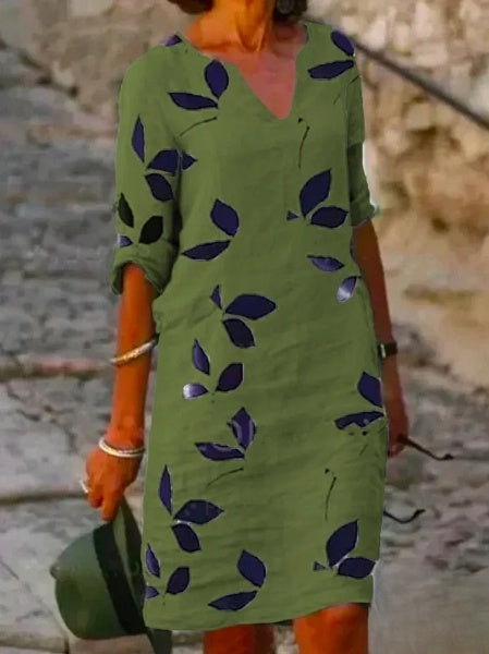 Robe été florale, manches 3/4, fluide et élégante.  Parfait pour l'été.