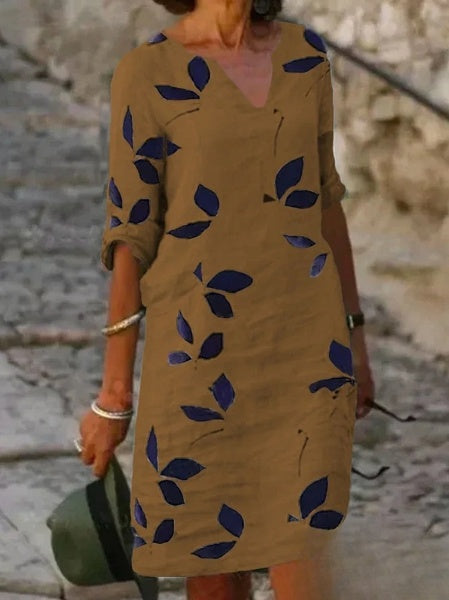Robe été florale, manches 3/4, fluide et élégante.  Parfait pour l'été.