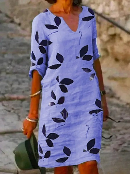 Robe été florale, manches 3/4, fluide et élégante.  Parfait pour l'été.
