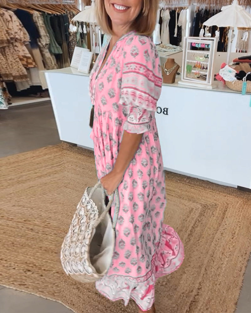 Robe imprimée Tallulah pour femme, col en V, manches mi-longues fluides. Style élégant et décontracté.