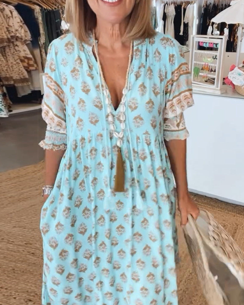 Robe fluide Tallulah imprimée confortable, col V, manches mi-longues. Style bohème printemps/été.