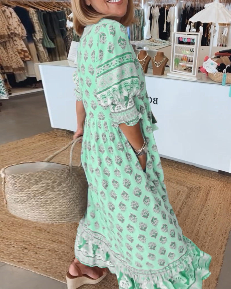 Robe polyvalente imprimée Tallulah, col V, manches mi-longues. Tenue chic ou décontractée, mode printemps-été.