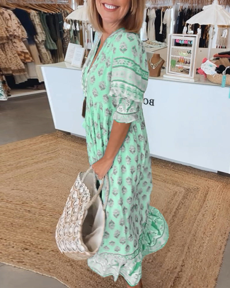 Robe femme imprimée Tallulah, col en V, manches mi-longues. Fluide, confortable, élégante. Parfaite pour l'été.