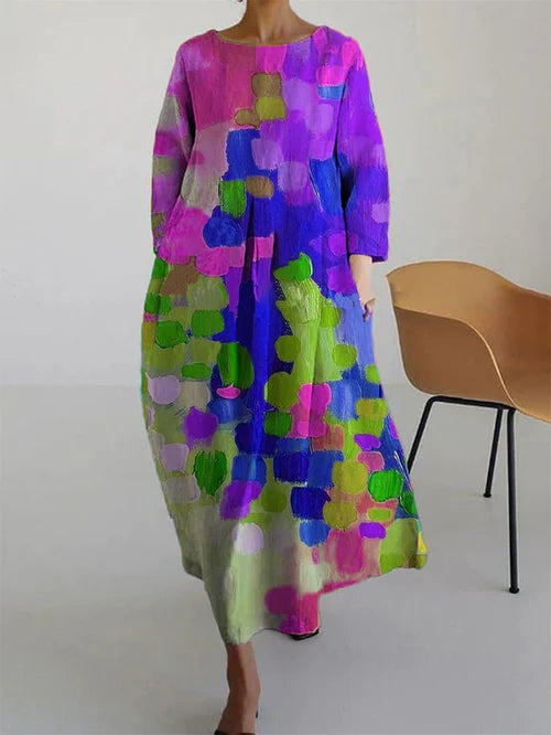 Robe fleurie Antonella pour femme, motif floral fluide violet, rouge, jaune. Idéale été, élégante et légère.