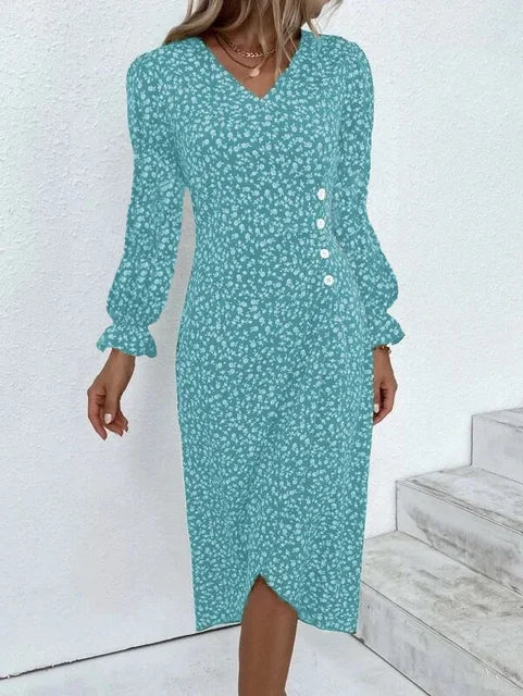 Robe fleurie élégante avec motifs floraux, coupe flatteuse et tissu léger. Idéale pour un look féminin et sophistiqué.