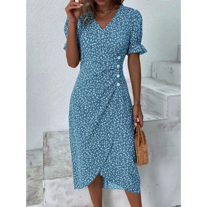 Robe fleurie élégante avec motifs floraux, coupe flatteuse et tissu léger. Idéale pour un look féminin et sophistiqué.