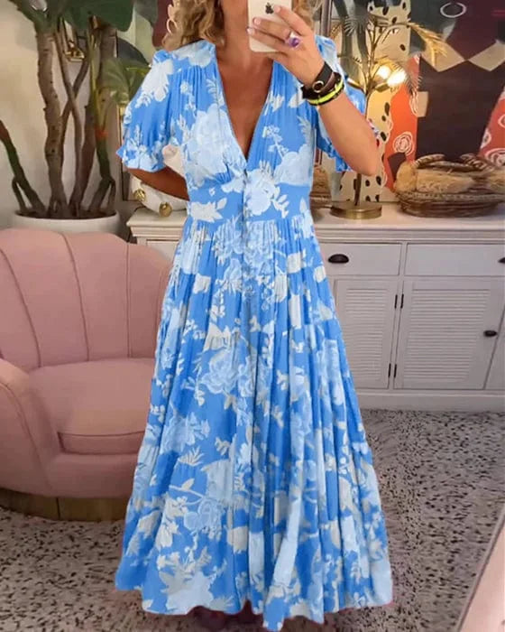 "Robe fluide et élégante Juliette, encolure en V, tissu léger, idéal pour occasions variées, sophistication naturelle"