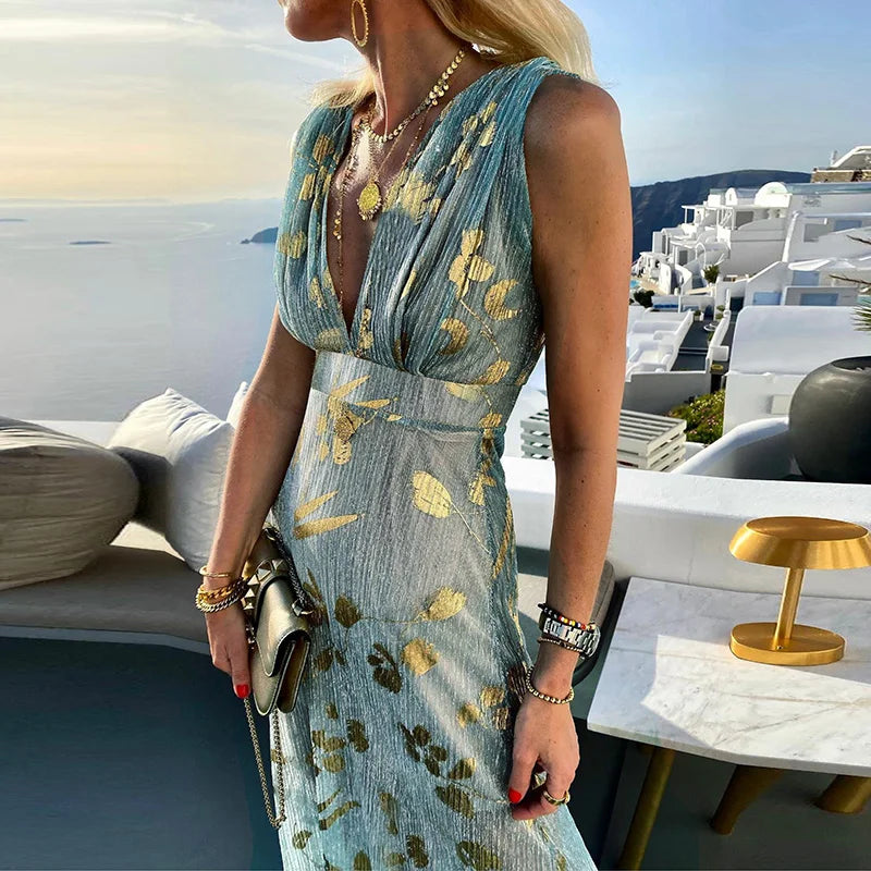 "Robe fluide été col V pailleté bleu ciel, glamour et confortable pour femmes."