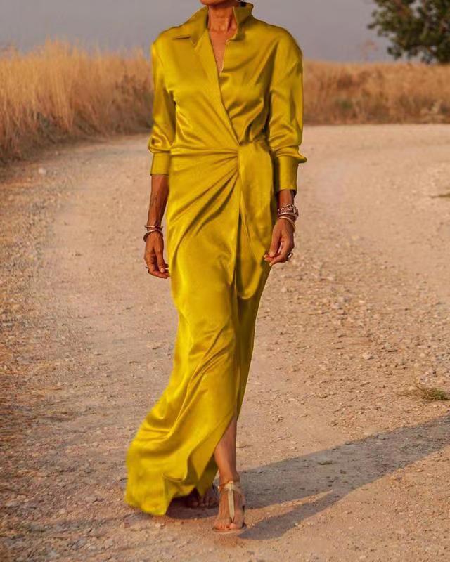Robe plissée polyvalente femme, élégante pour cocktail ou événement formel. Nouvelle collection mode féminine.