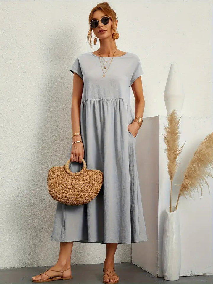 Robe lin élégante, poches, coupe flatteuse.  Parfait pour l'été.  Confortable et polyvalente.