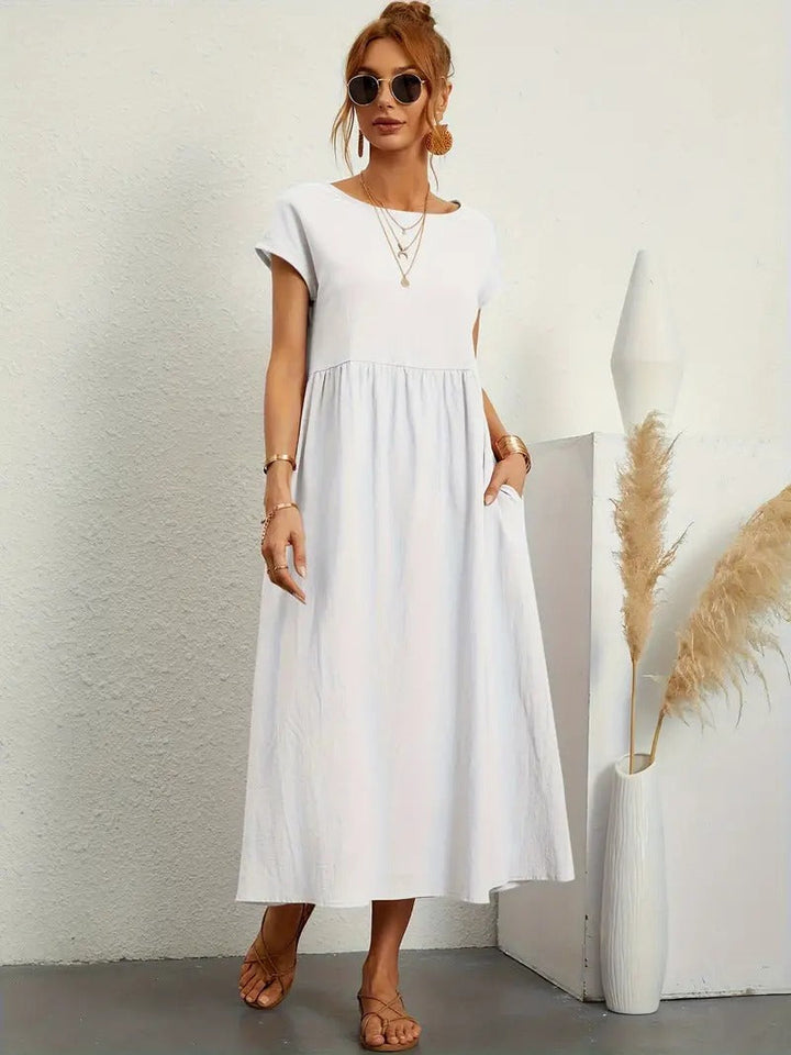 Robe lin élégante, poches, coupe flatteuse.  Parfait pour l'été.  Confortable et polyvalente.