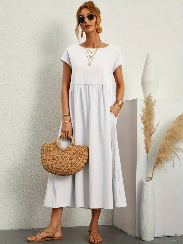 Robe lin élégante, poches, coupe flatteuse.  Parfait pour l'été.  Confortable et polyvalente.