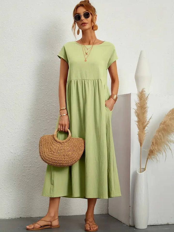 Robe lin élégante, poches, coupe flatteuse.  Parfait pour l'été.  Confortable et polyvalente.